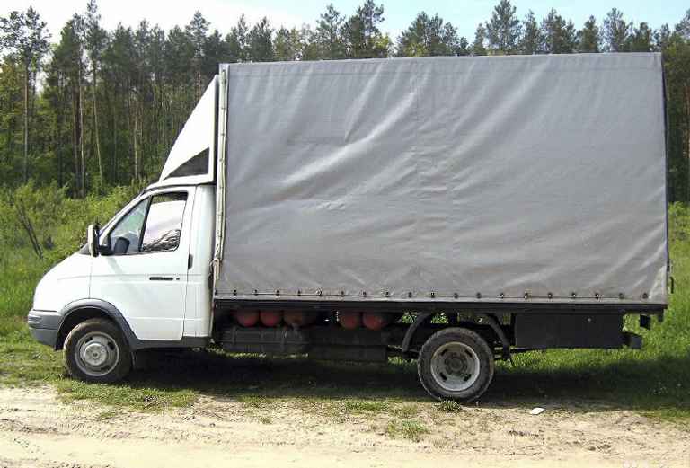 Заказ грузового такси для перевозки зерна из Богданович в Омск